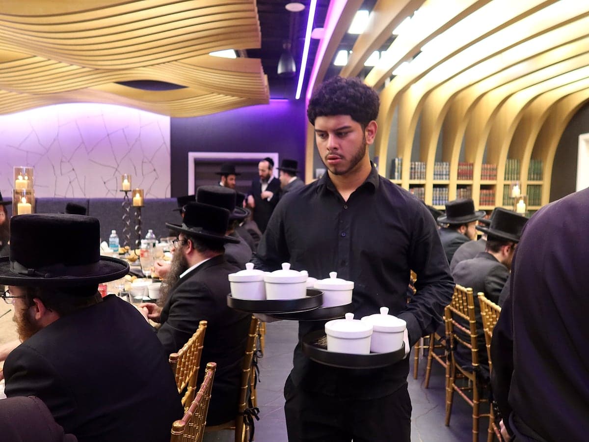 Carrying the first course out to the hall