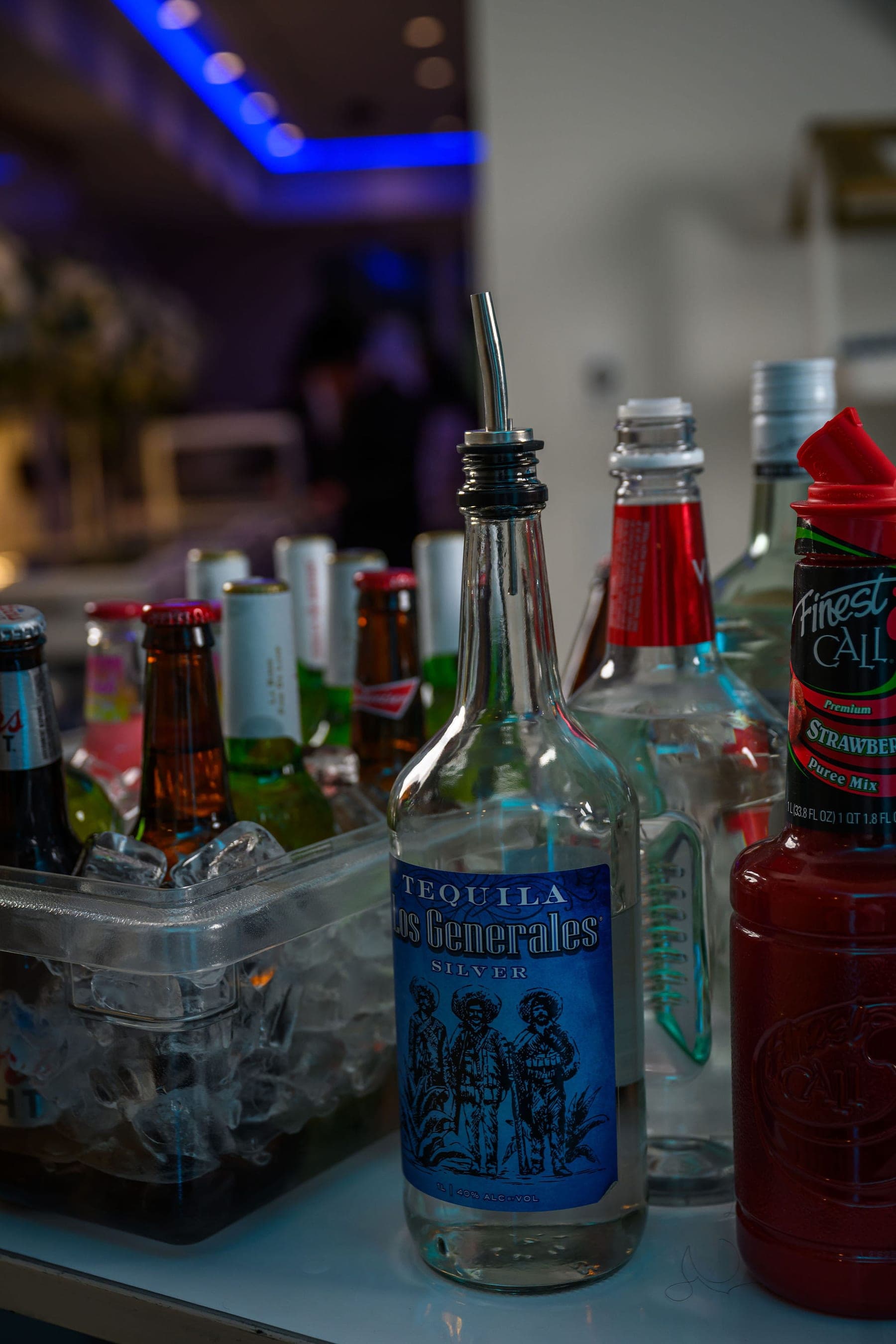Bottles and mixers standing in ice