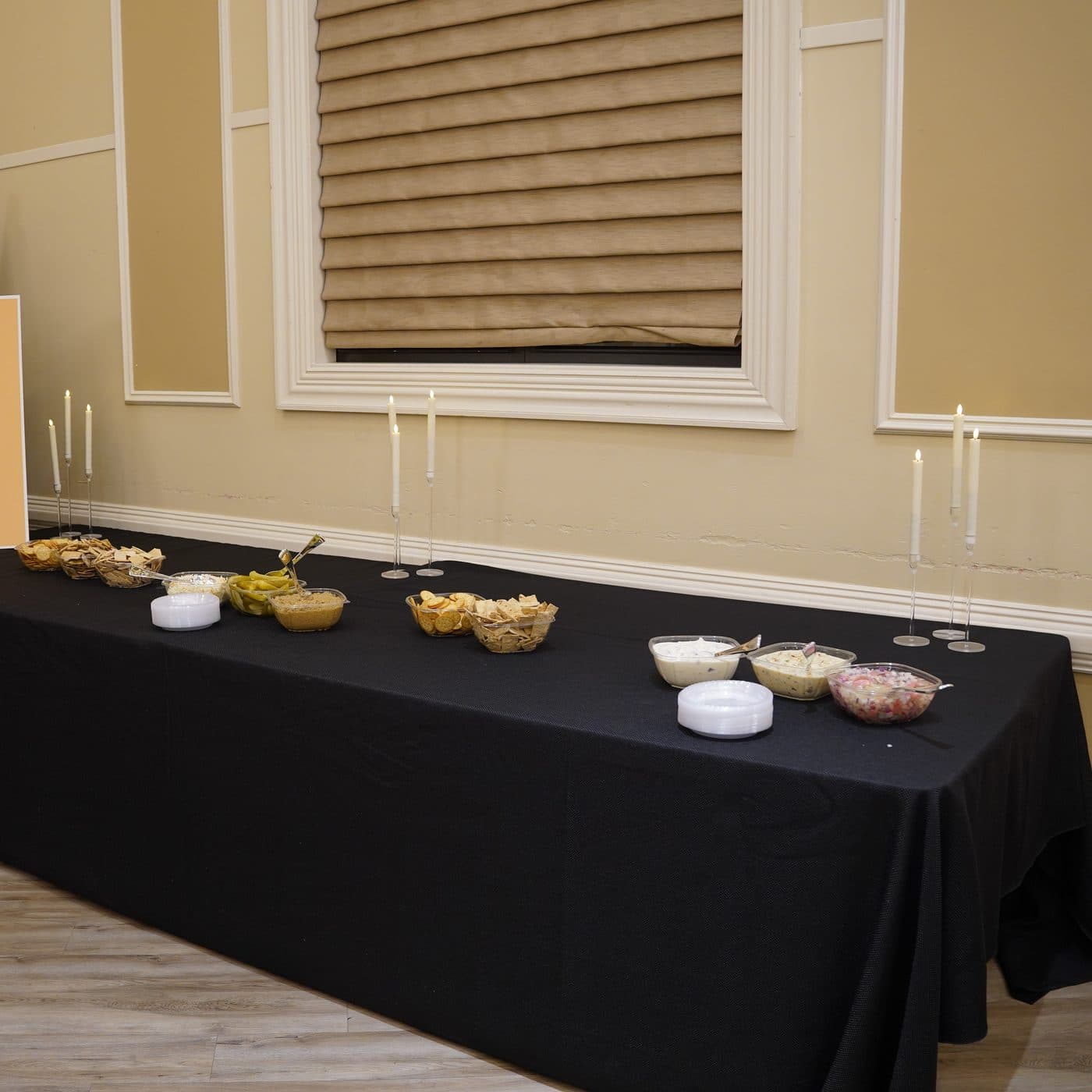 A shul kiddush laid out along the table