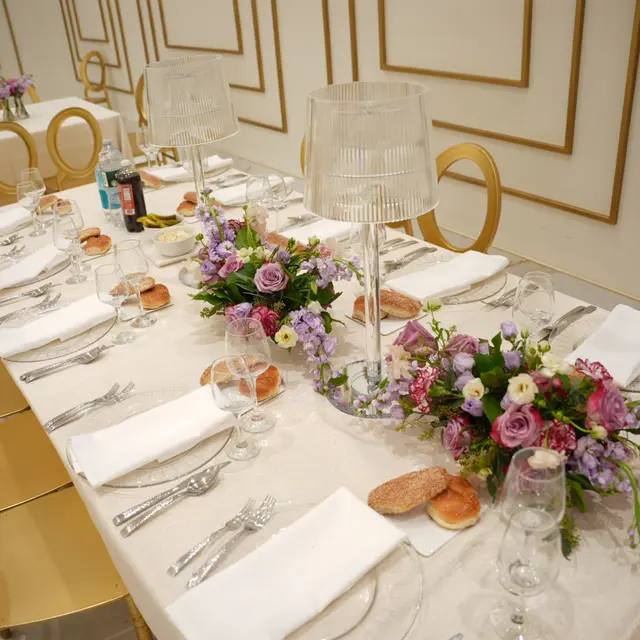 A Shabbos table set by Mashmanim