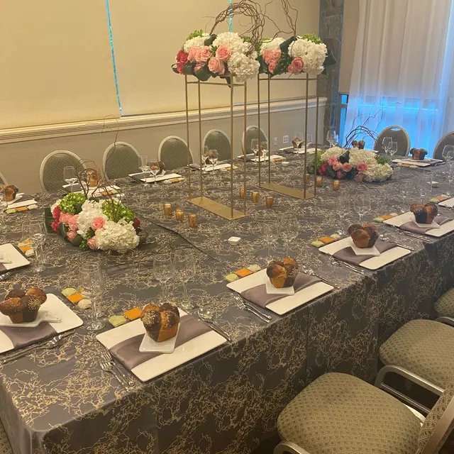 A Shabbos table set by Mashmanim