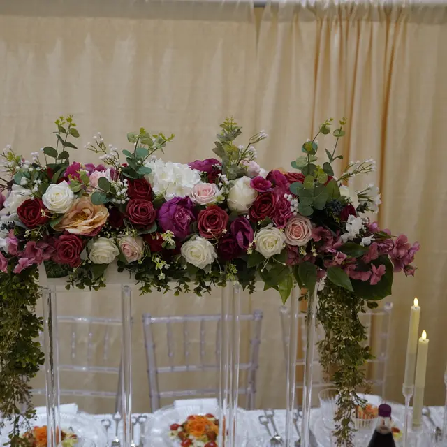 Flowers and centerpieces arranged by Mashmanim