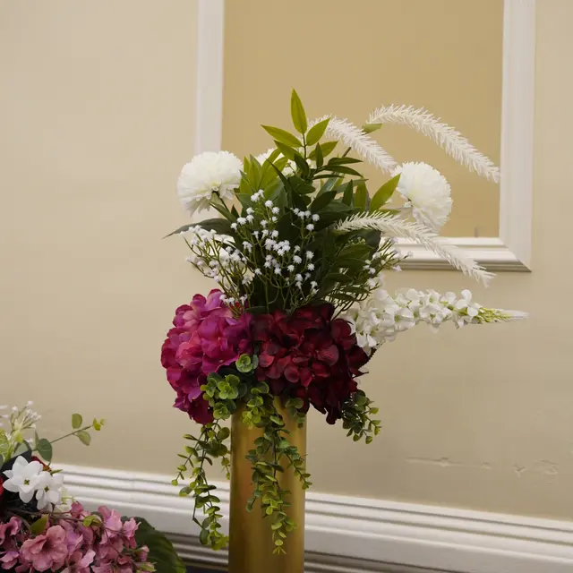 Flowers and centerpieces arranged by Mashmanim