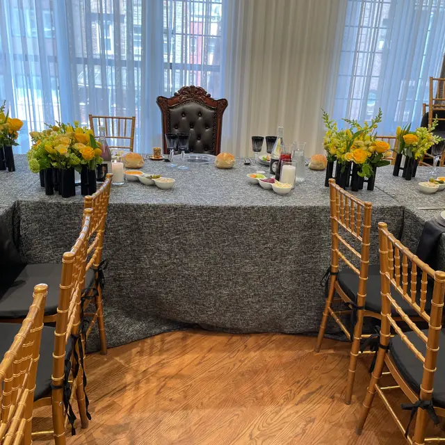Flowers and centerpieces arranged by Mashmanim