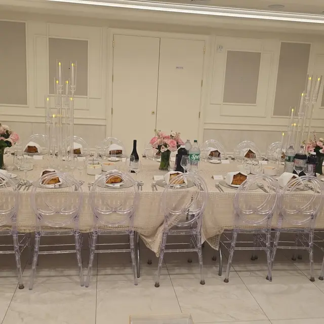 A Shabbos table set by Mashmanim