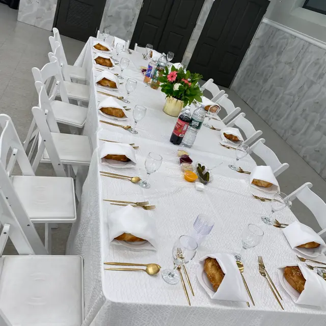 A Shabbos table set by Mashmanim